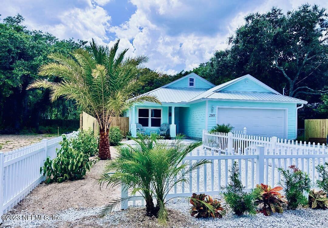 2585 A1A South St. Augustine, FL 32080 - Photo 1 of 37 a front view of house with a garden