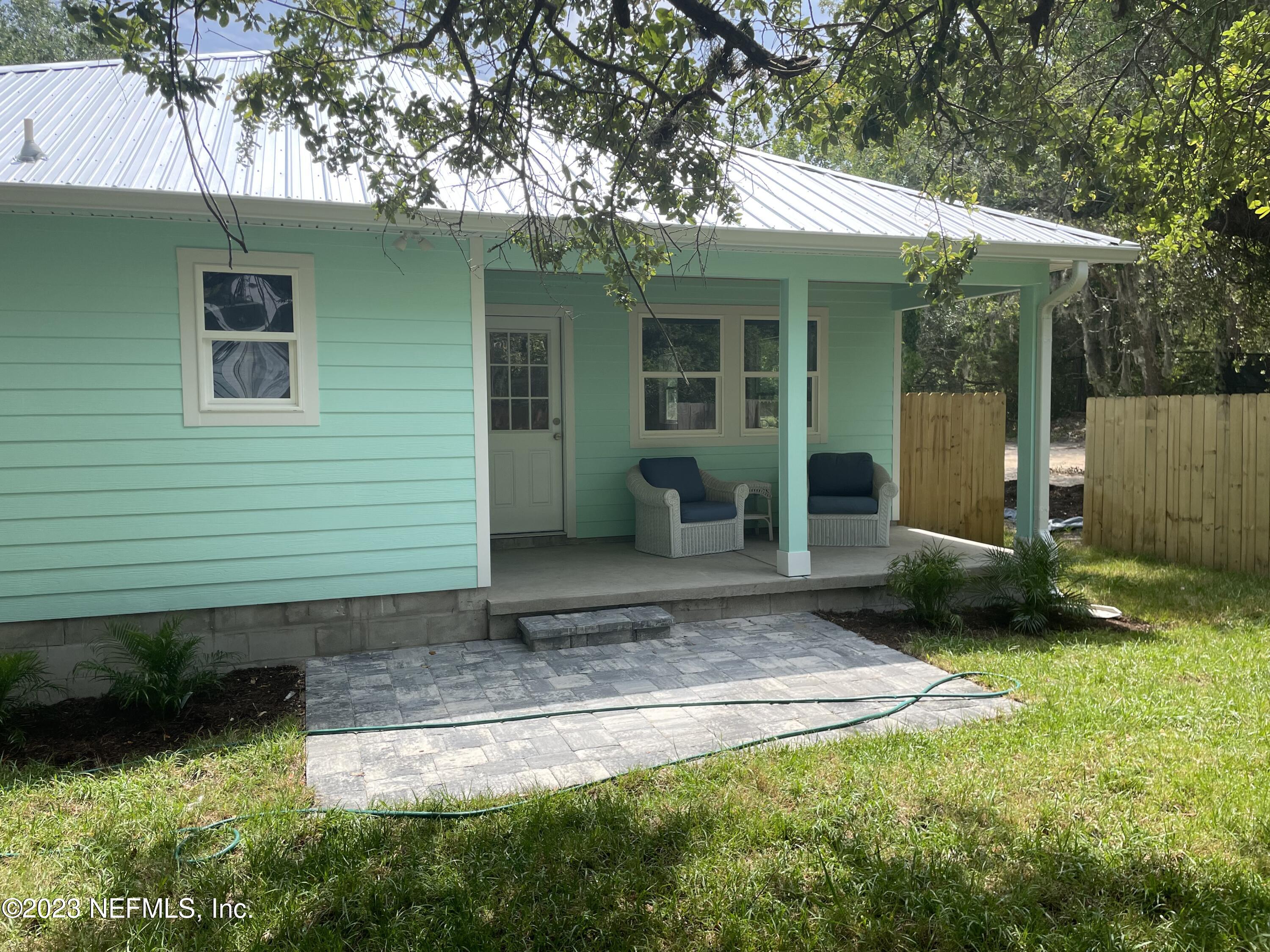 2585 A1A South St. Augustine, FL 32080 - Photo 12 of 37 front view of a house with a yard