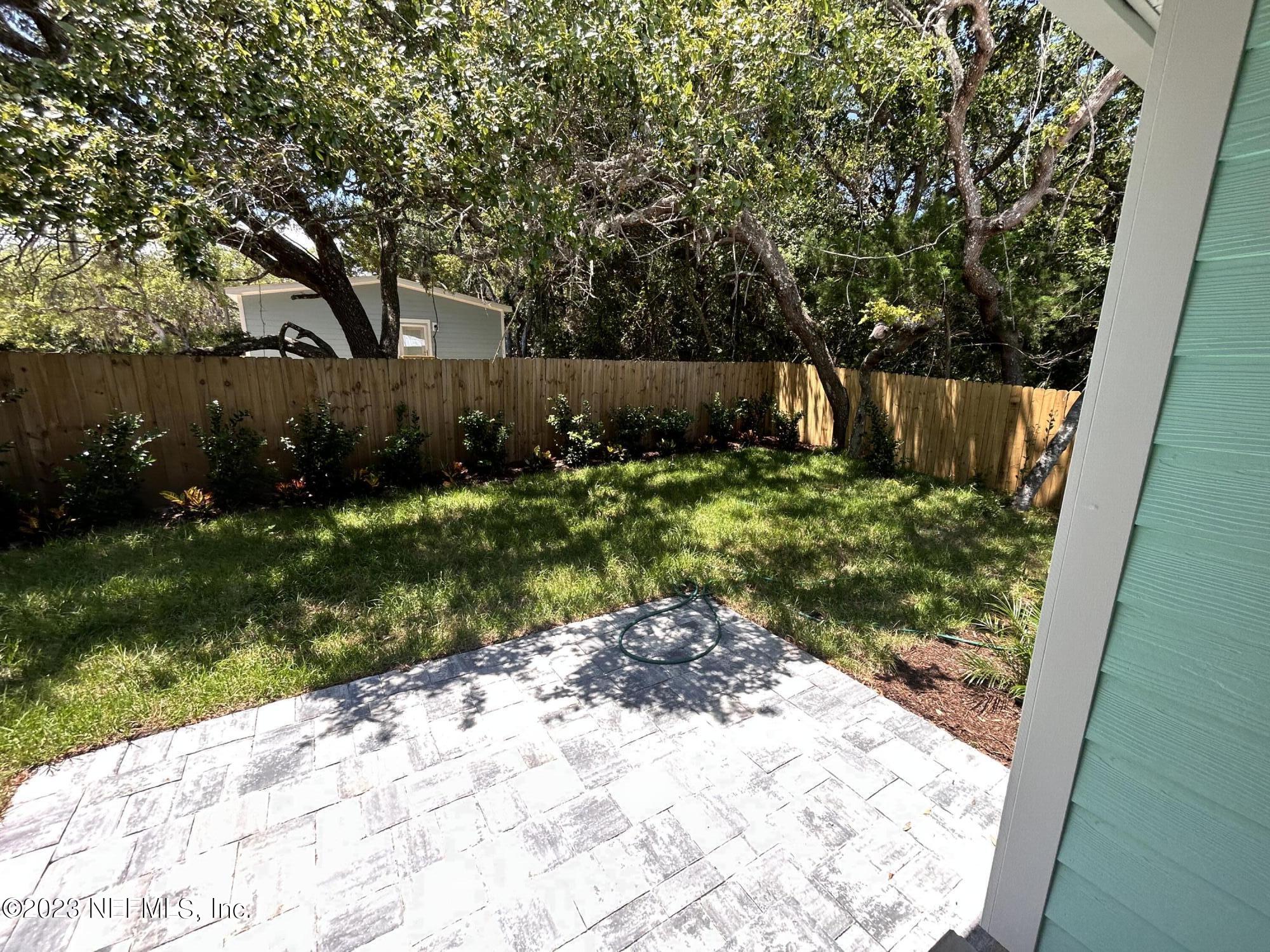 2585 A1A South St. Augustine, FL 32080 - Photo 8 of 37 a view of backyard with tree