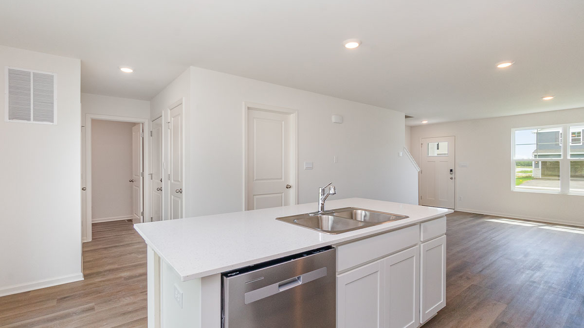 411 Conover Drive Joliet, IL 60421 - Photo 19 of 34 a kitchen with a sink cabinets and wooden floor