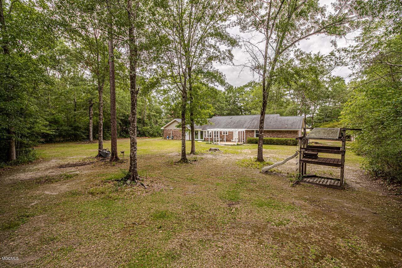 12488 Quail Ridge Road Gulfport, MS 39503 - Photo 11 of 35 QuailOutside back 1.1