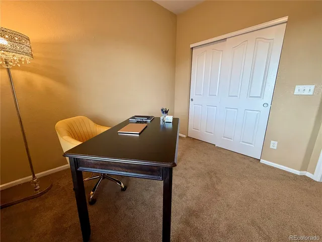 a bedroom with a bed and a cabinets