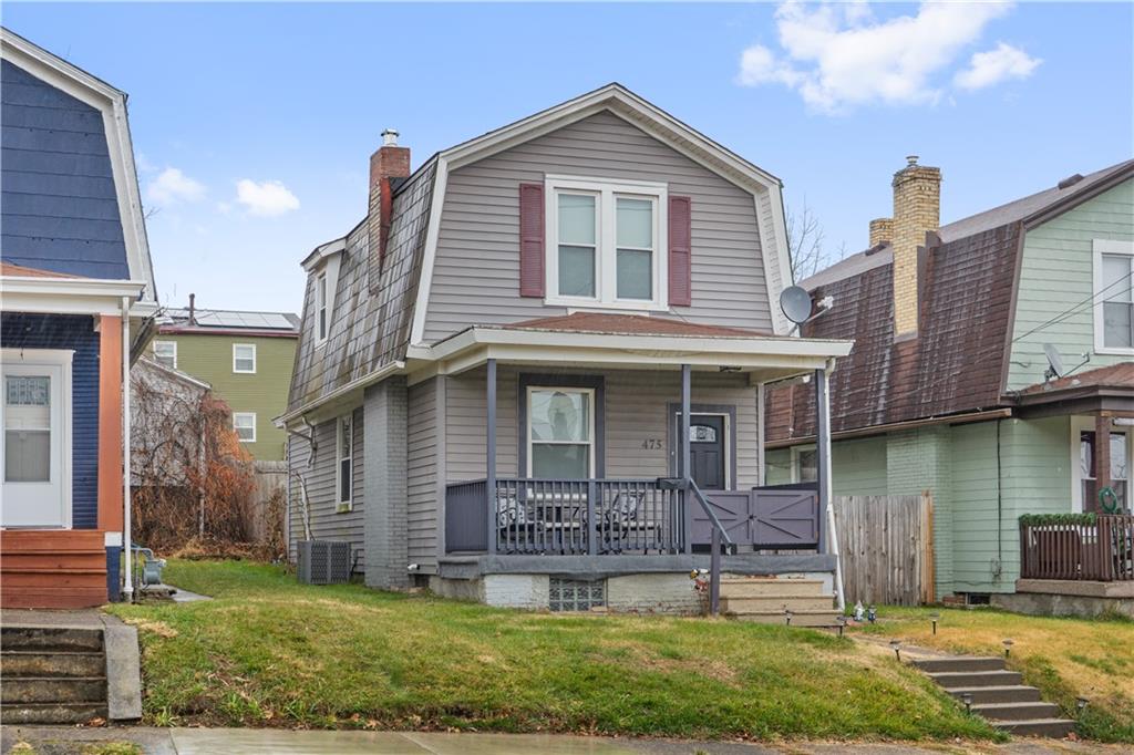 475 Irvin Avenue Rochester, PA 15074 - Photo 1 of 23 a front view of a house with a yard