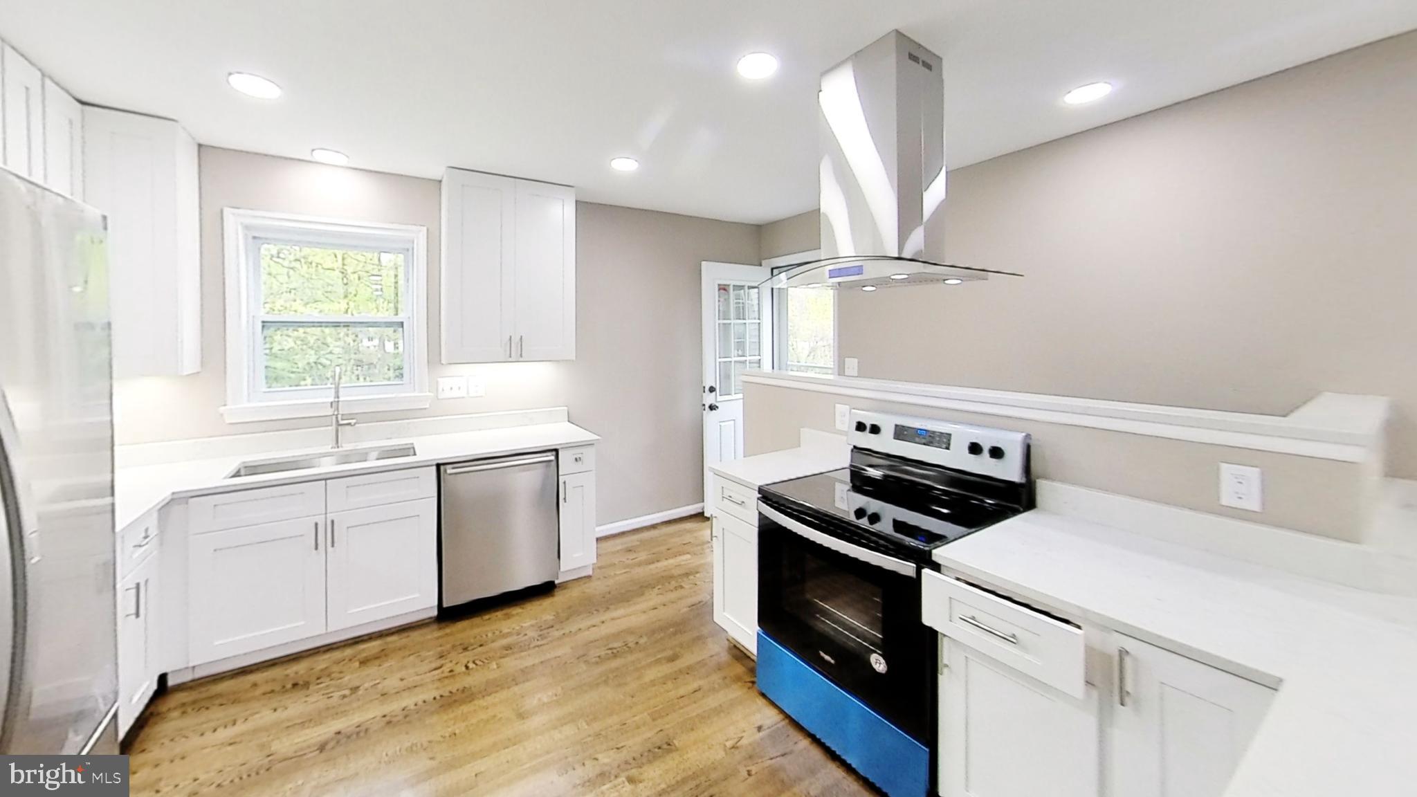 5611 Berwyn Road Berwyn Heights, MD 20740 - Photo 1 of 27 Gourmet Kitchen with chef's grade exhaust