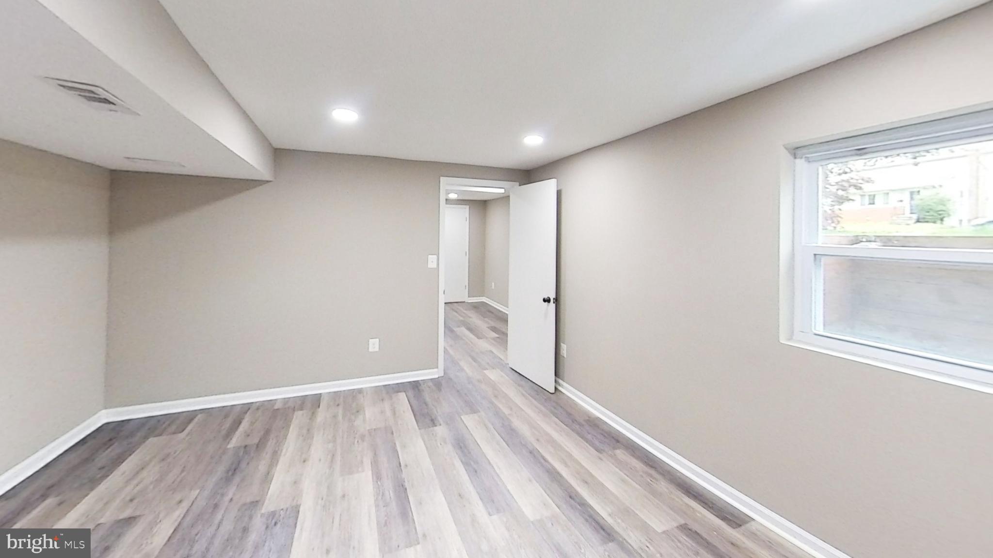 5611 Berwyn Road Berwyn Heights, MD 20740 - Photo 21 of 27 lower level large bedroom
