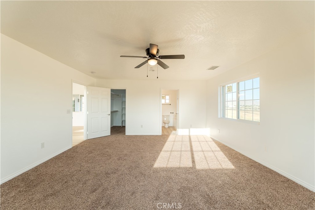 16925 Nanticoke Road Apple Valley, CA 92307 - Photo 55 of 87 wooden floor in an empty room with a window