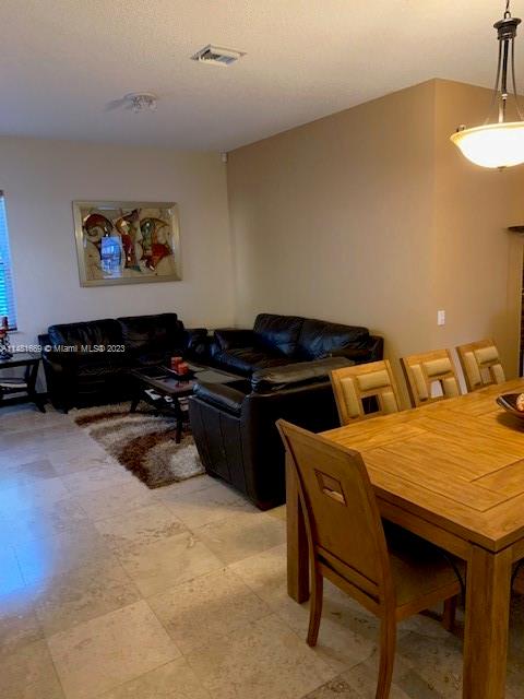 Savanna Weston, FL 33327 - Photo 5 of 9 a kitchen with a table and chairs