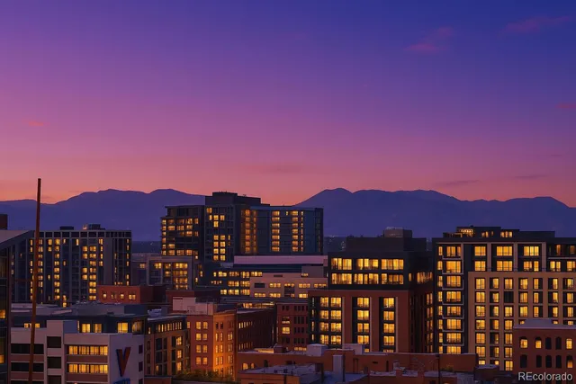 a view of building with a mountain