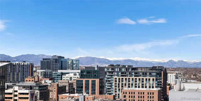 a view of a city with tall buildings
