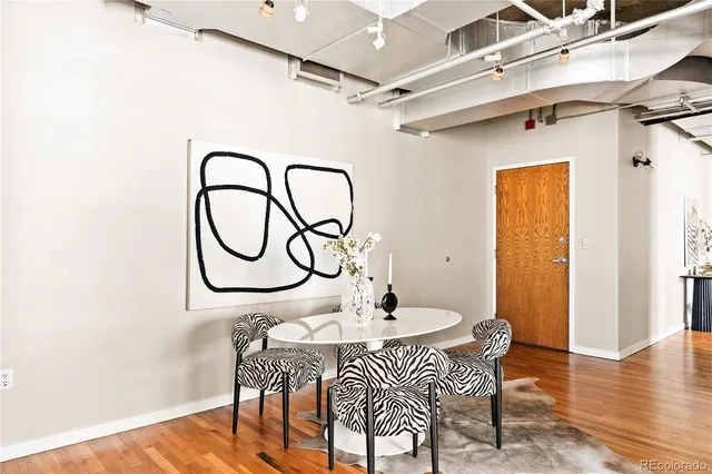 a view of a table and chairs in the room
