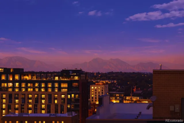 a view of a city with sunset