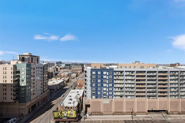 a view of a city with tall buildings