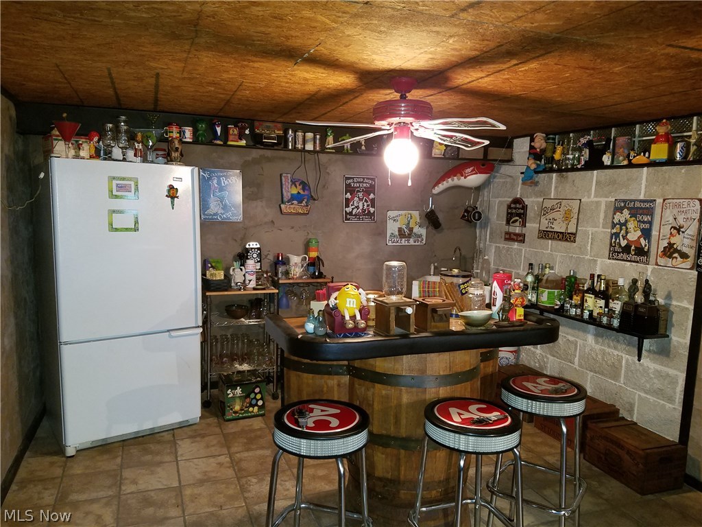 14042 Sprague Road Cleveland, OH 44130 - Photo 23 of 31 Don't miss out on the fun this finished basement has to offer. Call Today