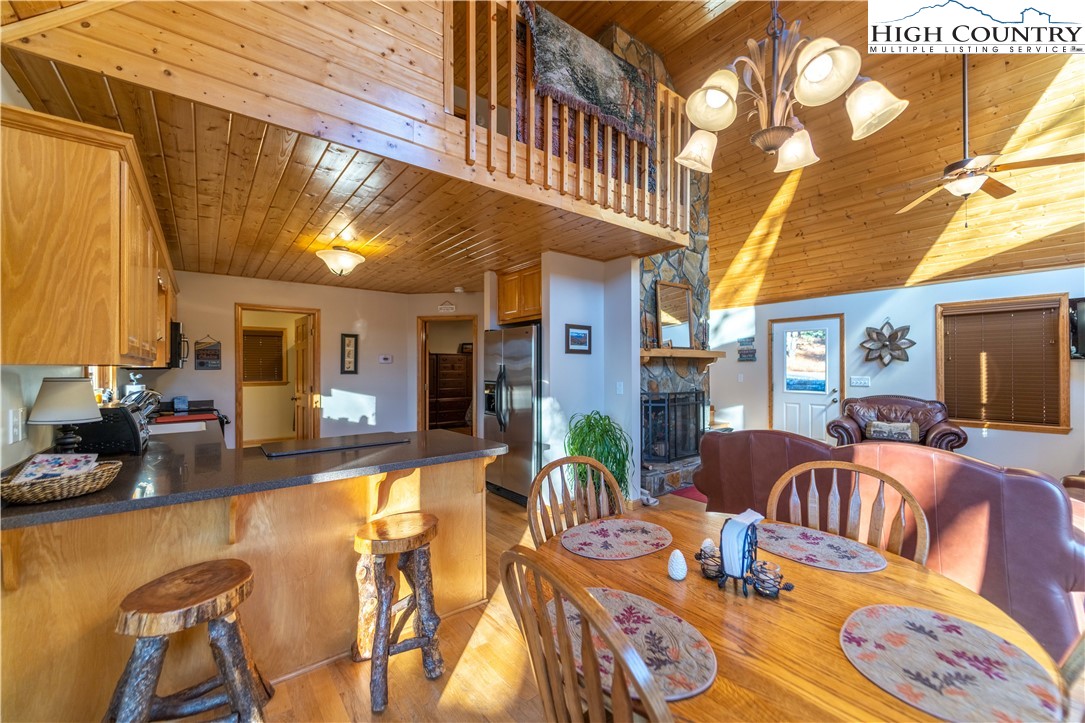 893 Deerwood Road Piney Creek, NC 28663 - Photo 13 of 50 a view of a livingroom with furniture