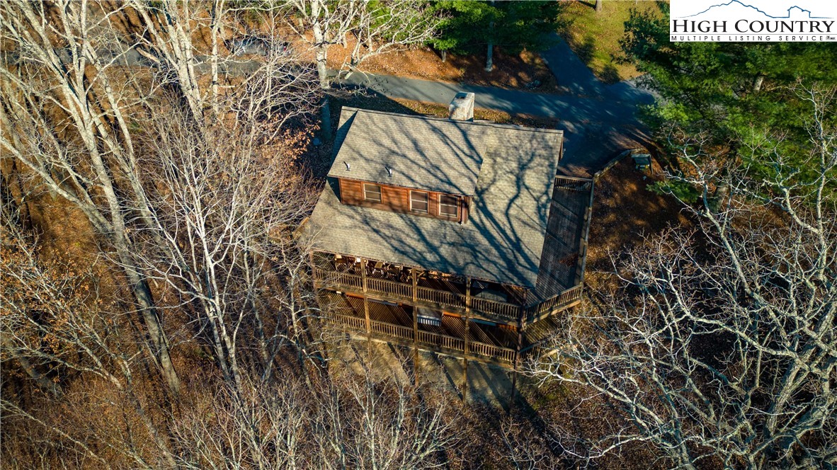 893 Deerwood Road Piney Creek, NC 28663 - Photo 46 of 50 a view of a pathway of a building