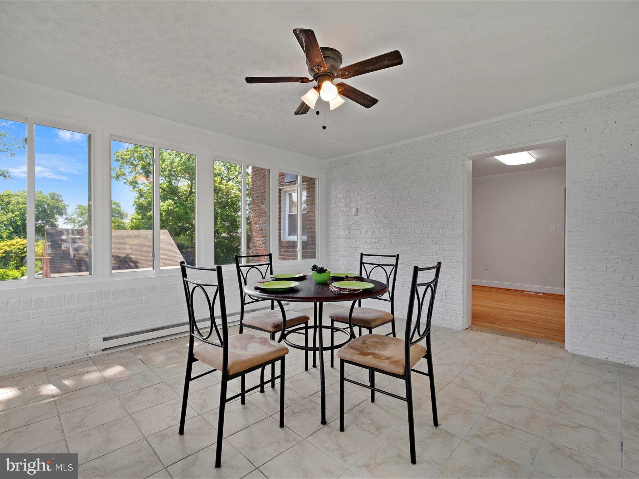 10109 Lorain Avenue Silver Spring, MD 20901 - Photo 11 of 48 a dining room with furniture and window