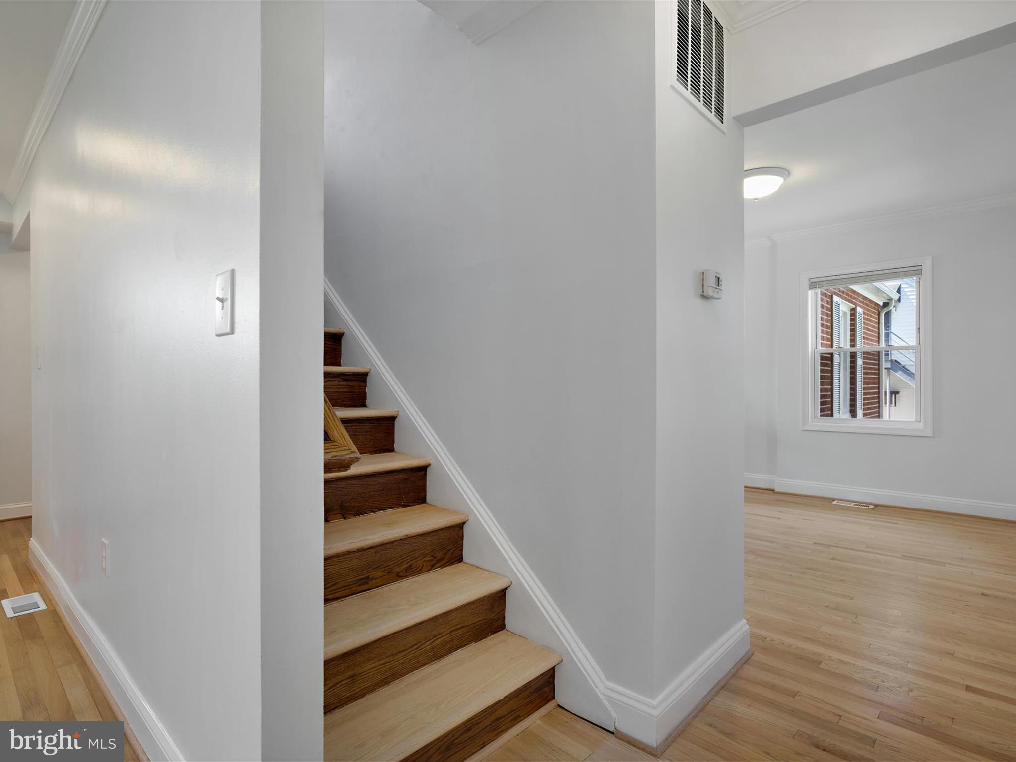 10109 Lorain Avenue Silver Spring, MD 20901 - Photo 13 of 48 a view of entryway with wooden floor