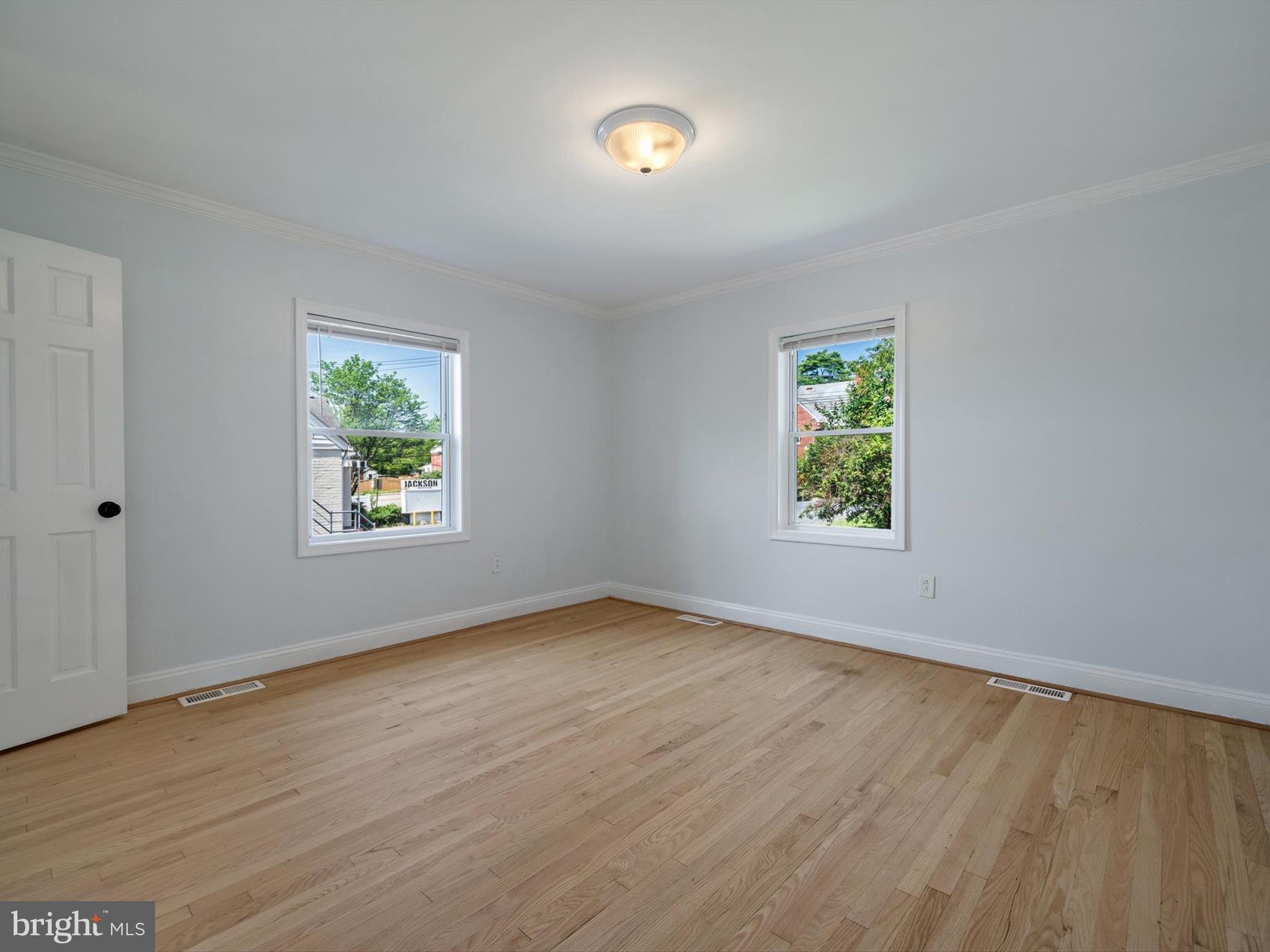 10109 Lorain Avenue Silver Spring, MD 20901 - Photo 17 of 48 an empty room with windows