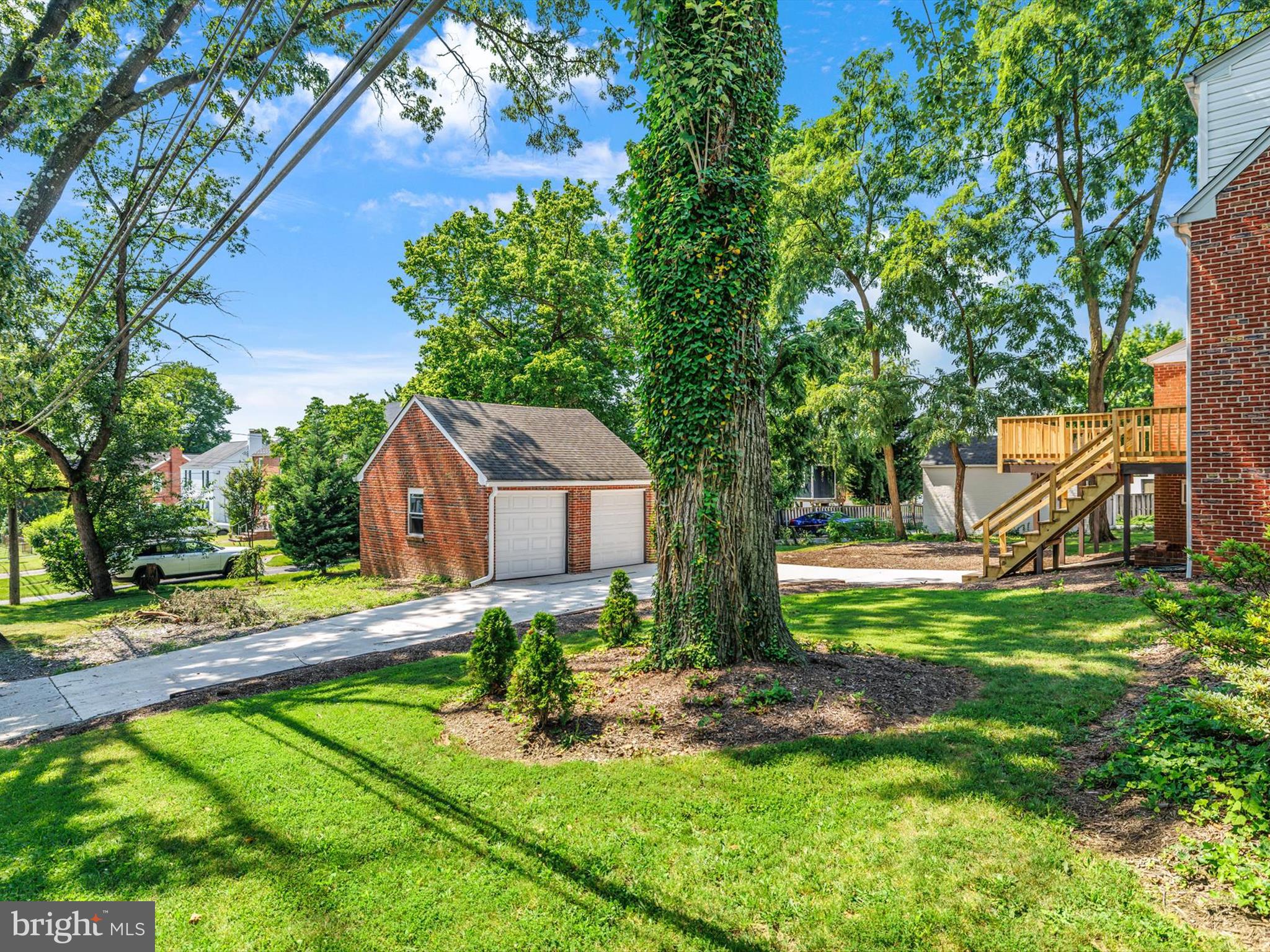 10109 Lorain Avenue Silver Spring, MD 20901 - Photo 2 of 48 a front view of a house with garden