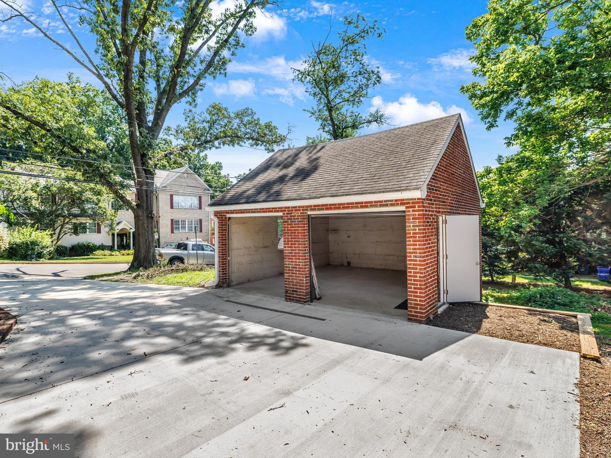 10109 Lorain Avenue Silver Spring, MD 20901 - Photo 38 of 48 a view of a house with a yard and large tree