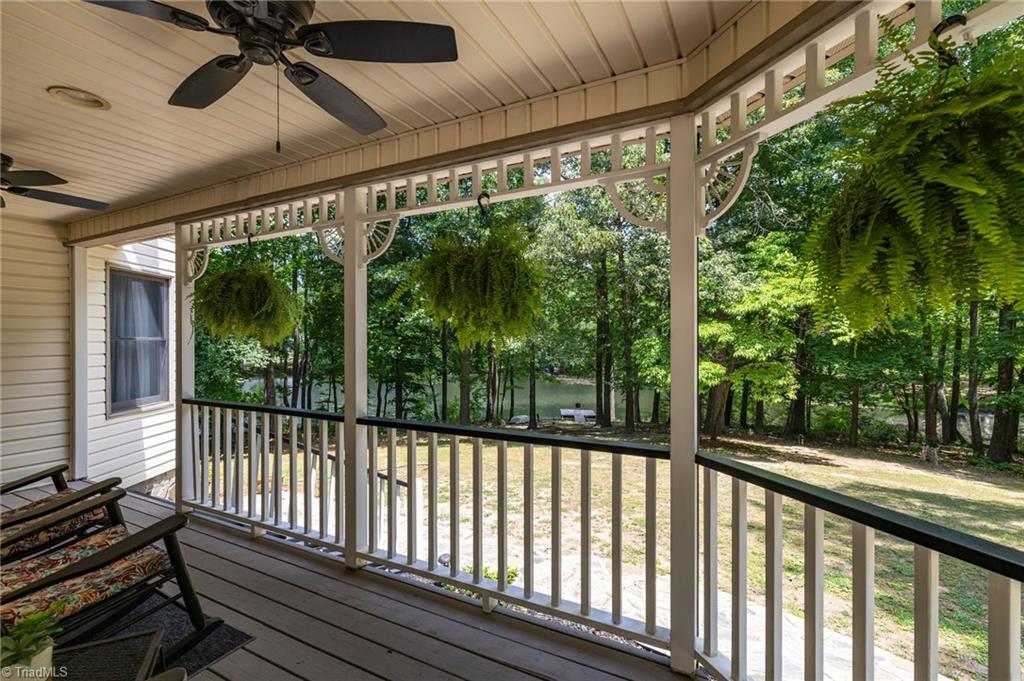2800 Spencers Grove Road Browns Summit, NC 27214 - Photo 11 of 49 On wrap around front porch. You can see the pond.