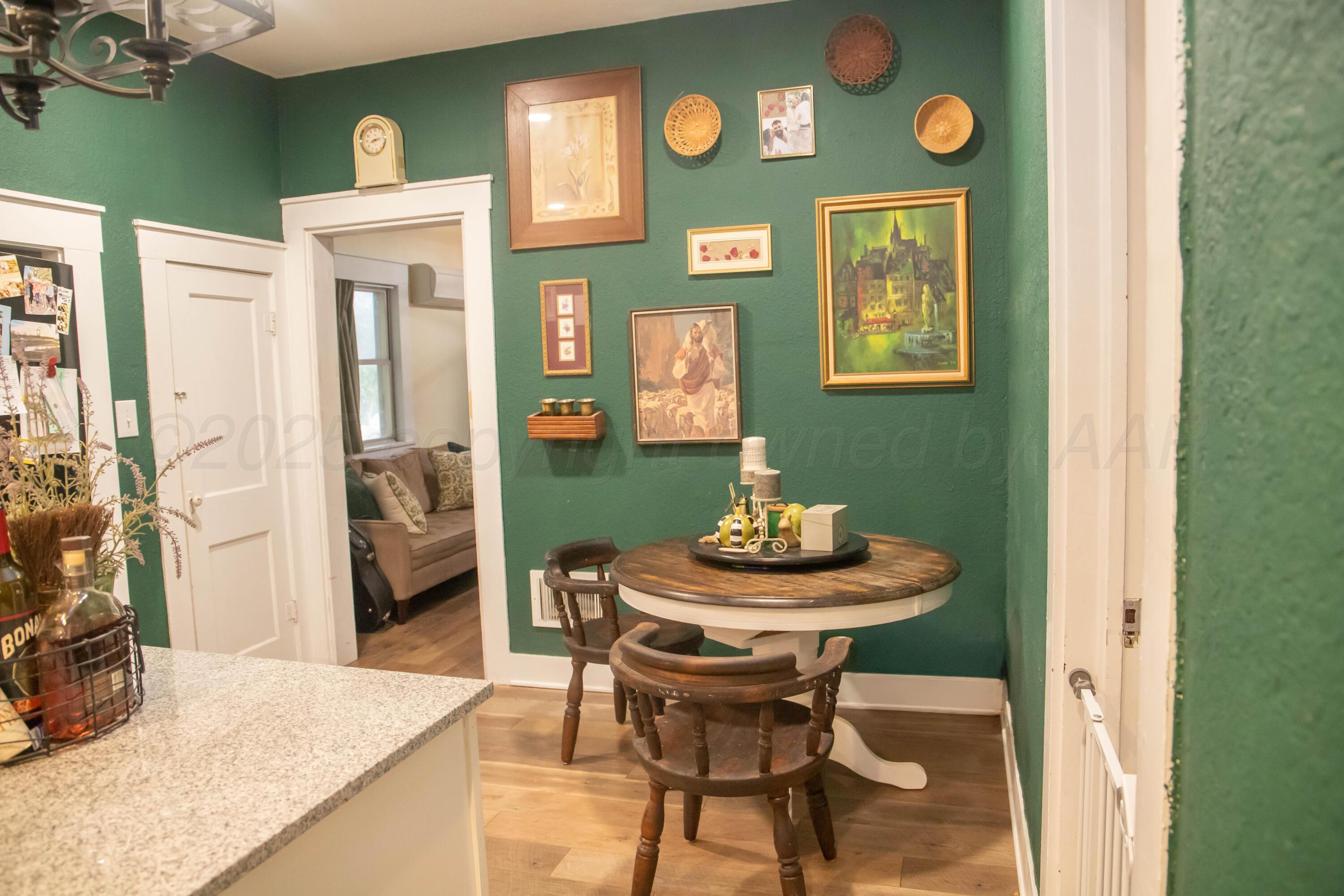 300 East Broadway Street Panhandle, TX 79068 - Photo 16 of 23 a view of a dining room with furniture and a table
