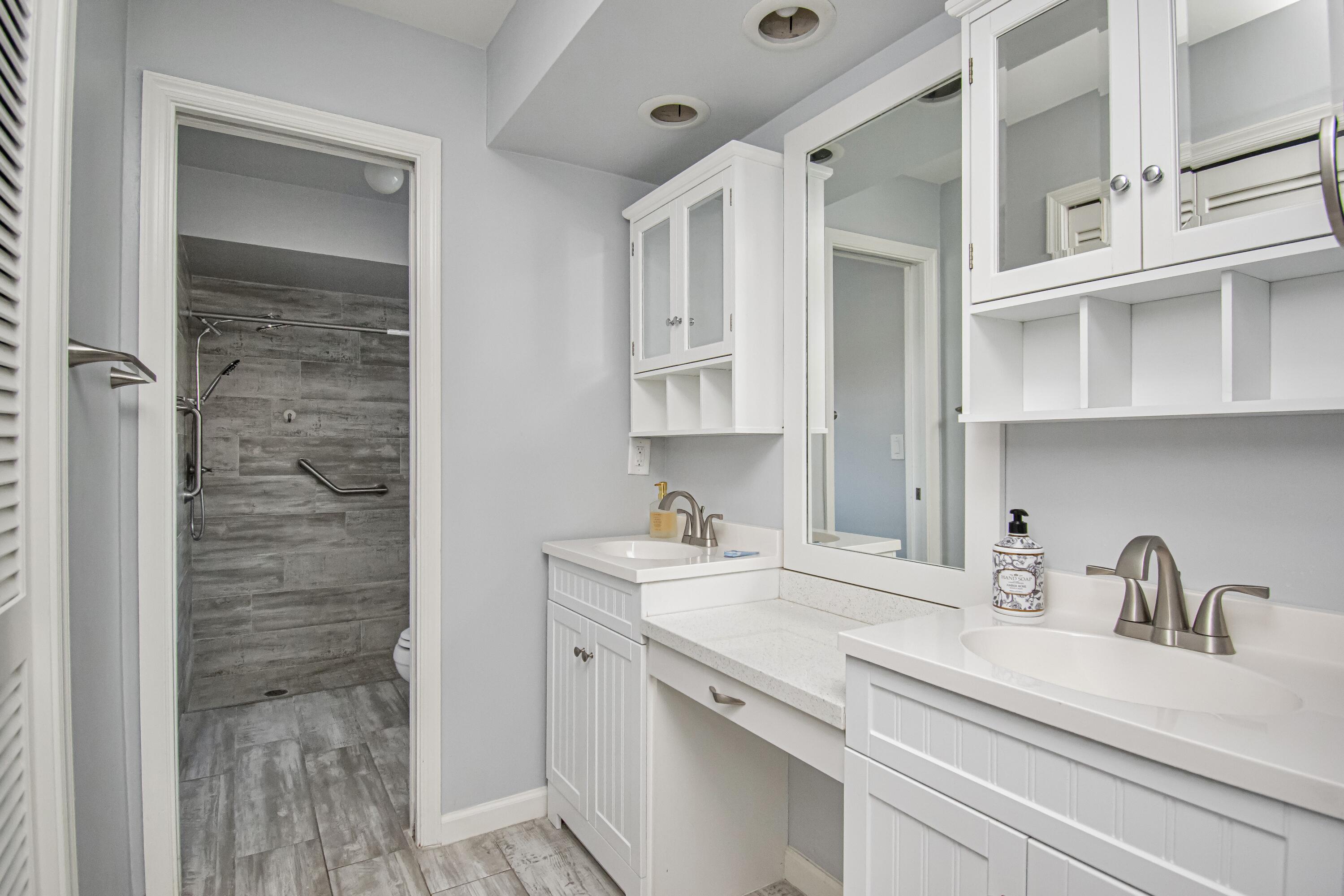 7706 Solimar Circle Boca Raton, FL 33433 - Photo 18 of 28 a kitchen with a sink and cabinets