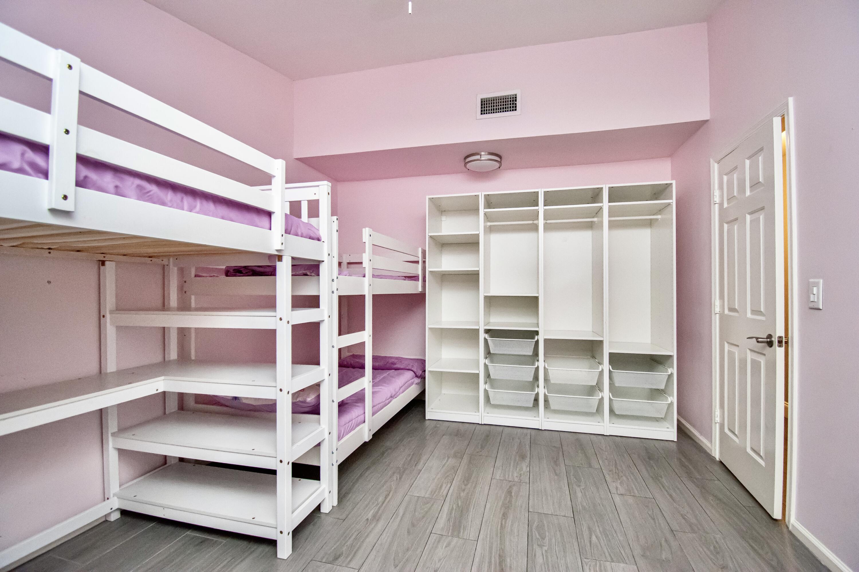 7706 Solimar Circle Boca Raton, FL 33433 - Photo 24 of 28 a bedroom with bunk bed and a window