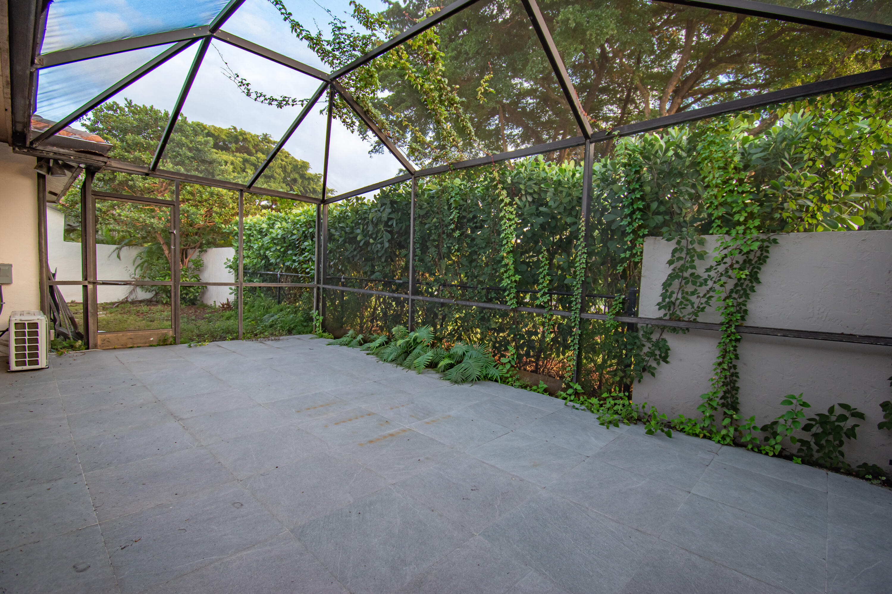 7706 Solimar Circle Boca Raton, FL 33433 - Photo 26 of 28 a view of a backyard