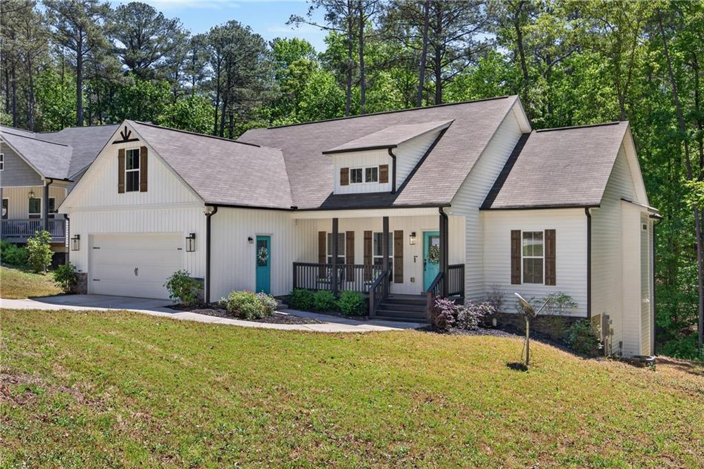 30 Buffelhead Court Monticello, GA 31064 - Photo 2 of 37 a house with swimming pool in front of it