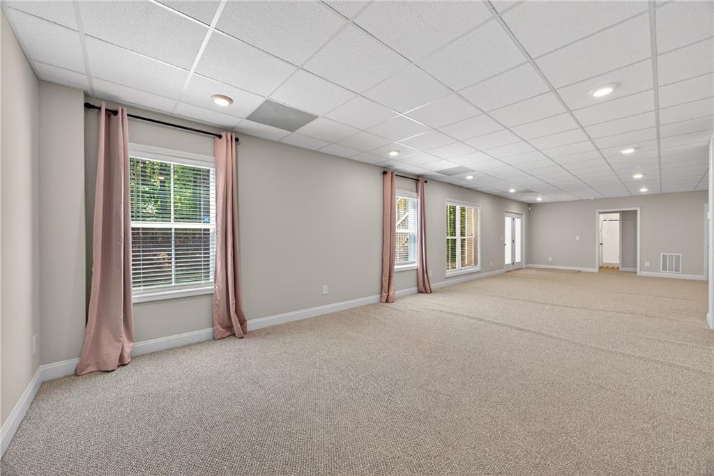 30 Buffelhead Court Monticello, GA 31064 - Photo 21 of 37 a view of an empty room with a window