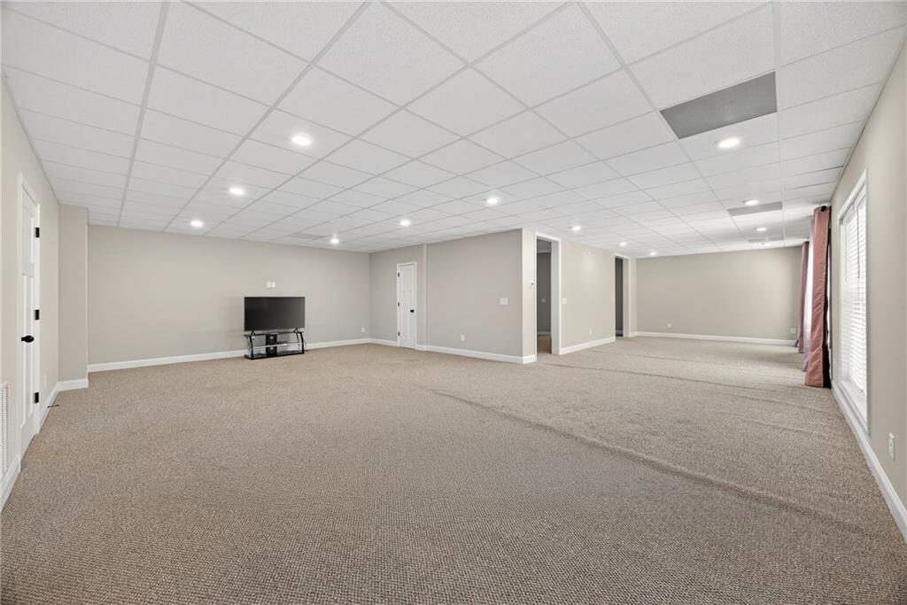30 Buffelhead Court Monticello, GA 31064 - Photo 22 of 37 a view of empty room with a projector
