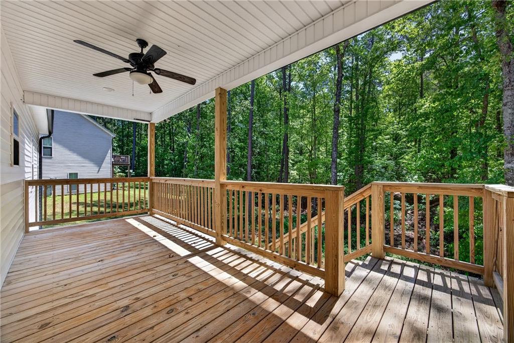 30 Buffelhead Court Monticello, GA 31064 - Photo 25 of 37 a view of a balcony with wooden floor