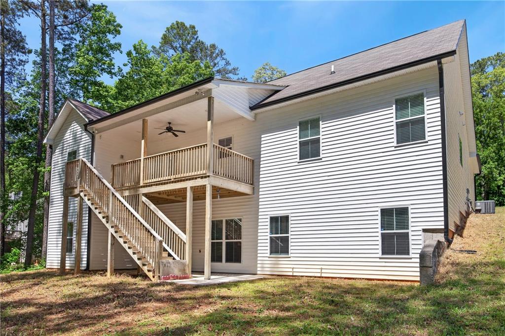 30 Buffelhead Court Monticello, GA 31064 - Photo 27 of 37 a view of a house with a yard