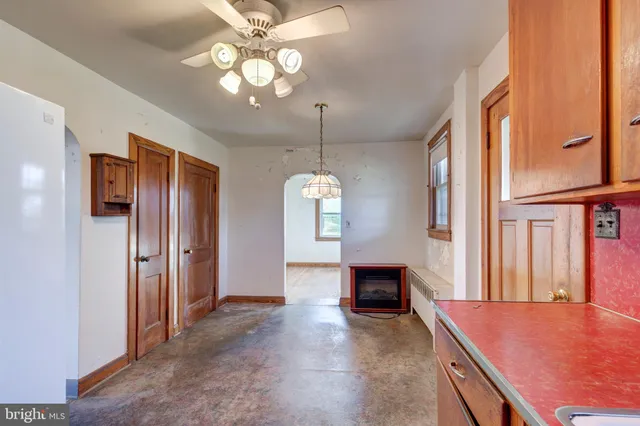 a view of a livingroom with furniture window and wooden floor