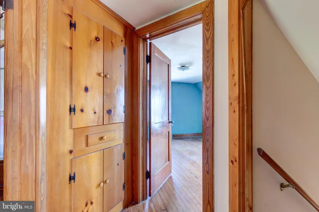 a view of a bathroom from a hallway