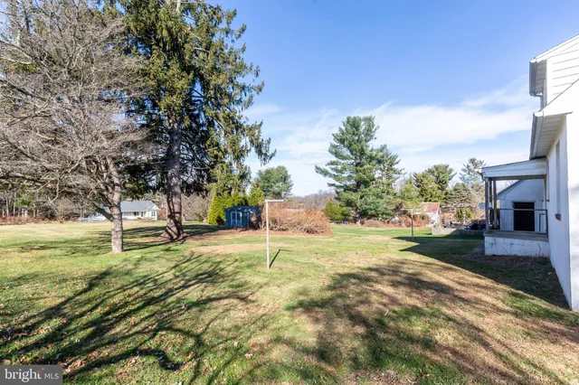 a house with yard in front of it