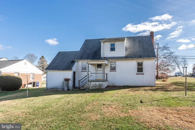 a house view with a garden space