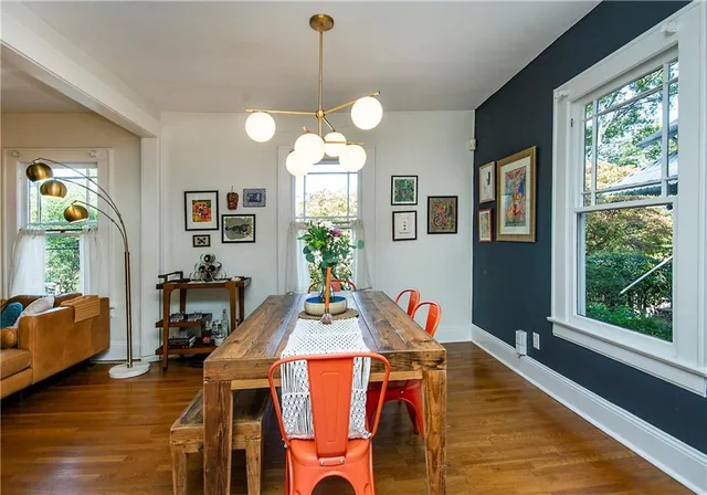 a bathroom with a sink a mirror a toilet and a bathtub