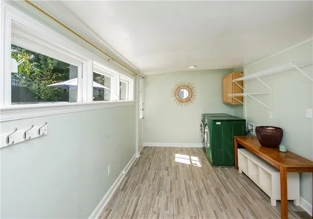 a view of a park with slide on the table and chairs