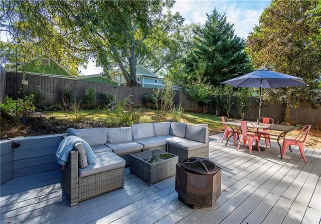 a bedroom with furniture and a fireplace