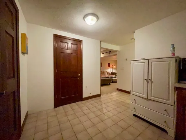a view of a livingroom with wooden floor