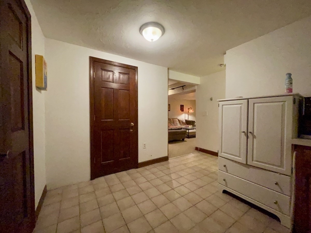 15 Burghardt Street, Unit B Worcester, MA 01604 - Photo 15 of 30 a view of a livingroom with wooden floor