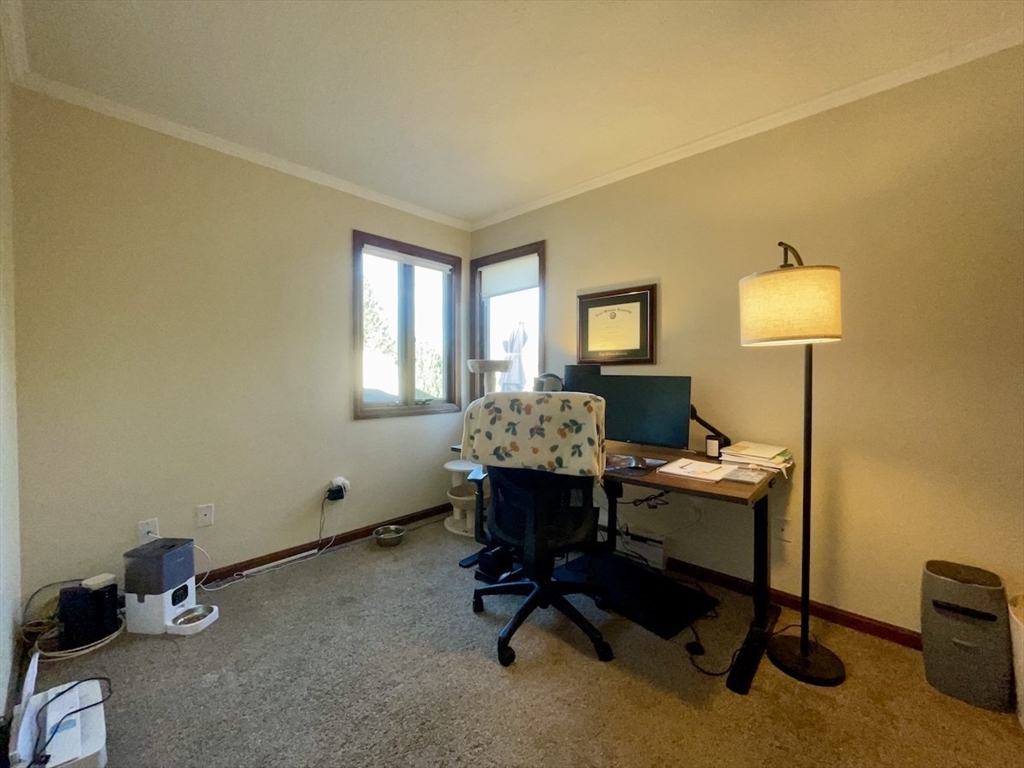 15 Burghardt Street, Unit B Worcester, MA 01604 - Photo 24 of 30 a workspace with furniture and a window