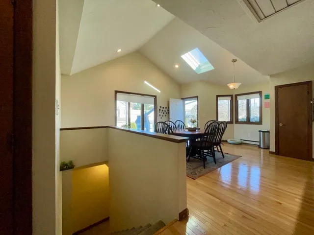 a view of a livingroom with furniture and wooden floor