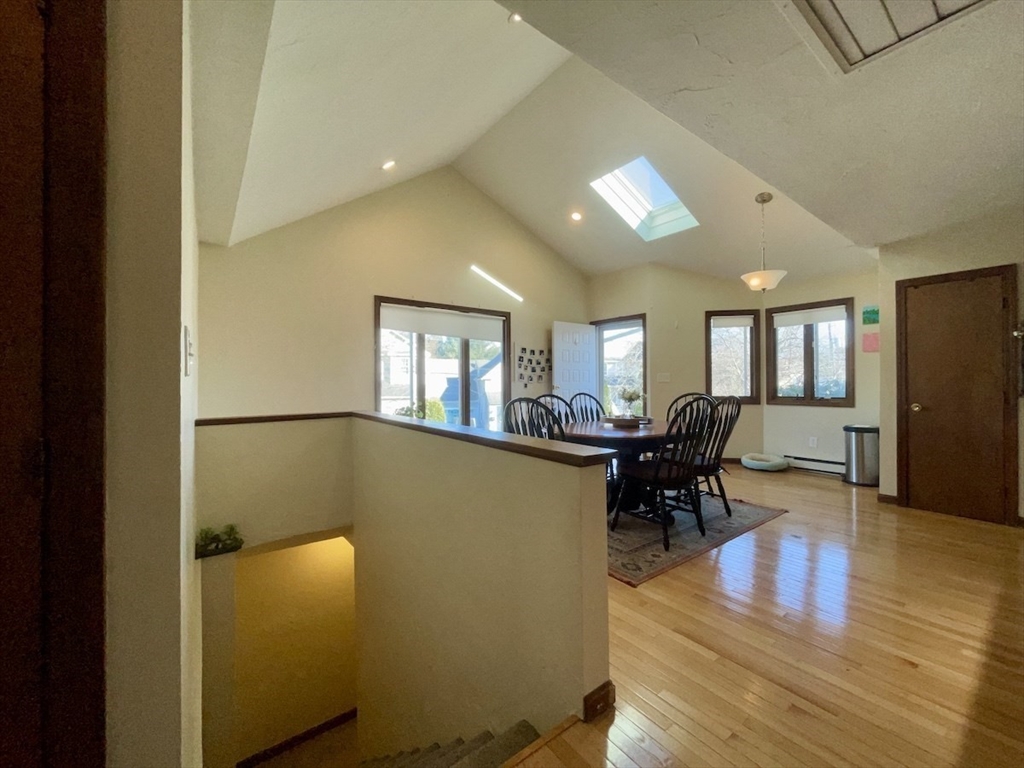 15 Burghardt Street, Unit B Worcester, MA 01604 - Photo 3 of 30 a view of a livingroom with furniture and wooden floor
