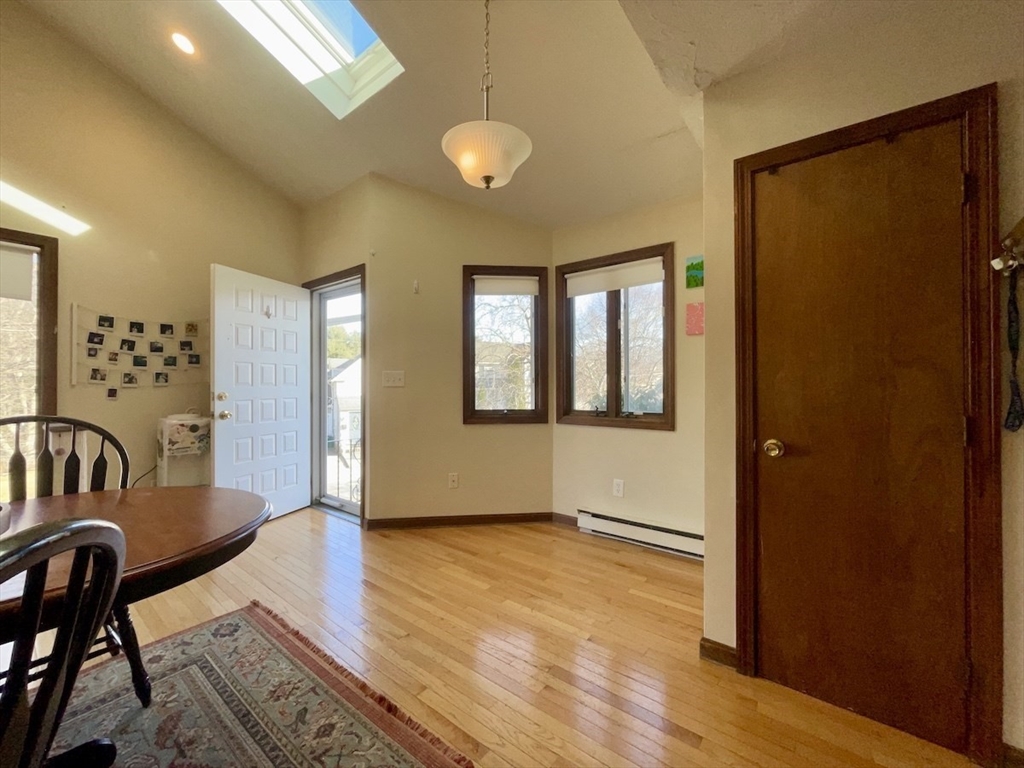 15 Burghardt Street, Unit B Worcester, MA 01604 - Photo 4 of 30 a view of a livingroom with furniture and windows