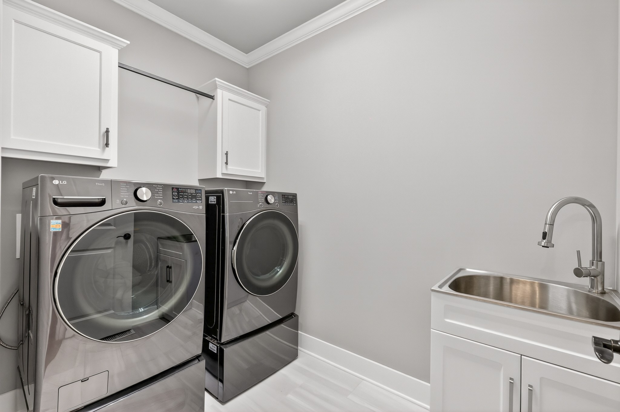 1176 Iron Bridge Road Columbia, TN 38401 - Photo 23 of 53 a utility room with sink dryer and washer