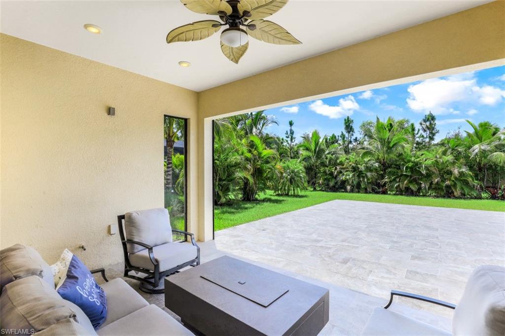 2134 Antigua Lane Naples, FL 34120 - Photo 22 of 31 a living room with furniture