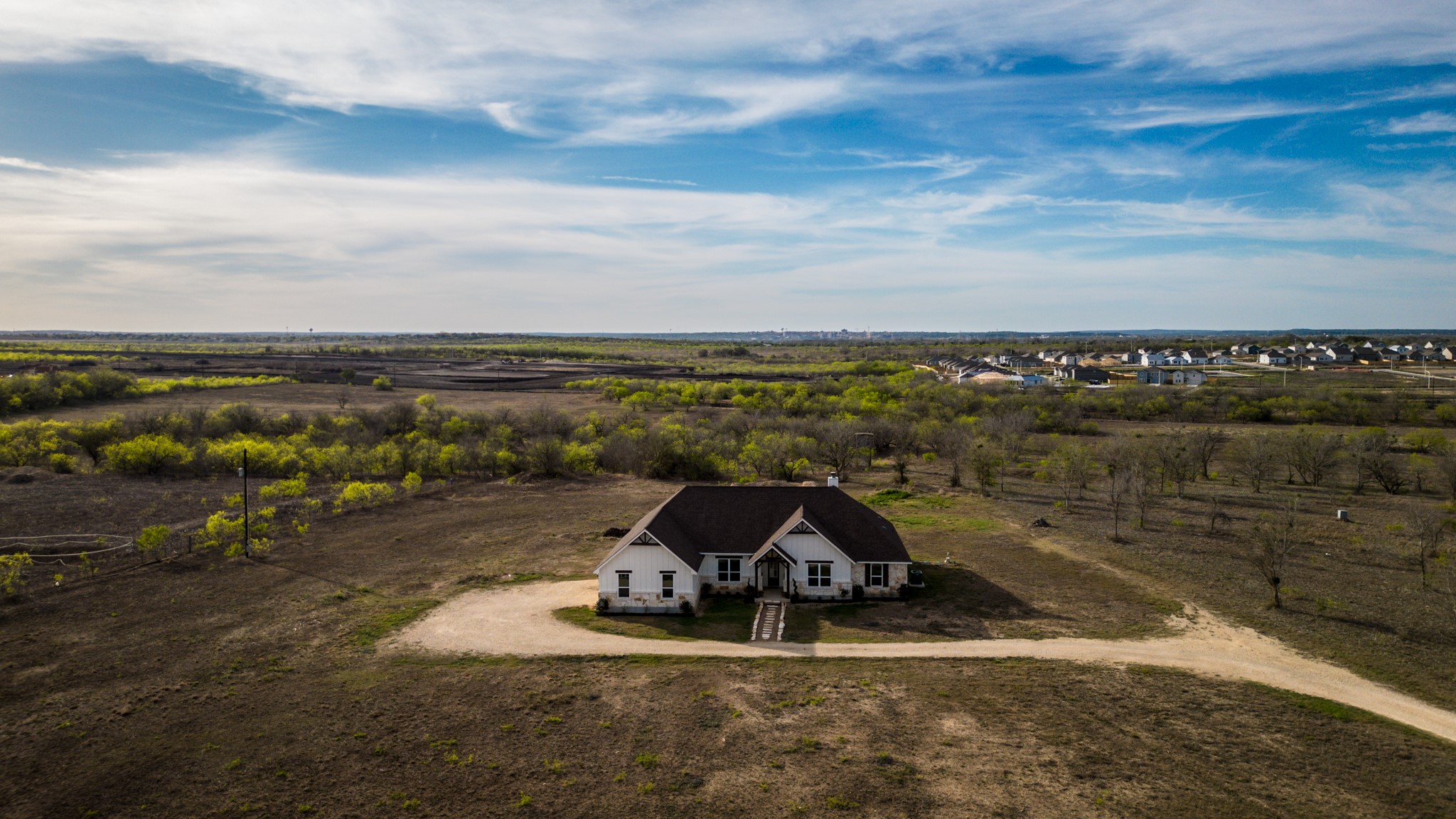 1642 Scull Road San Marcos, TX 78666 - Photo 29 of 31 Drone view showcasing the full 10-acre property, providing a clear perspective of its size and setting.